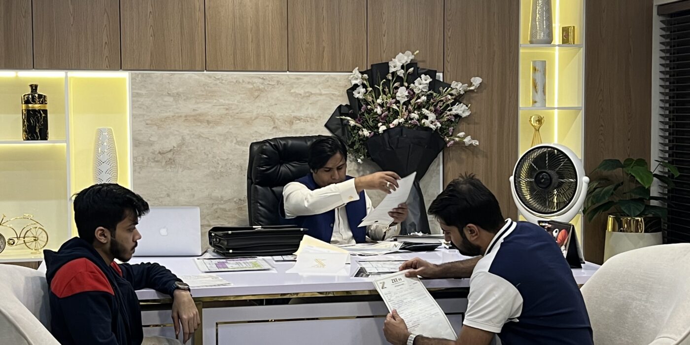 A client visiting Zee99’s Bahria Town Lahore office, appreciating the professionalism and transparency of the team.