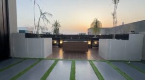 Luxury 5 marla house in Bahria Town Lahore with modern rooftop BBQ lounge and glass wardrobes