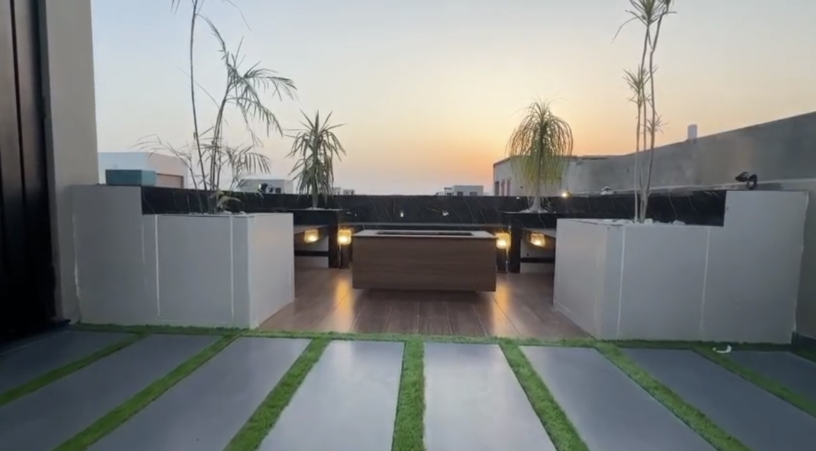 Luxury 5 marla house in Bahria Town Lahore with modern rooftop BBQ lounge and glass wardrobes